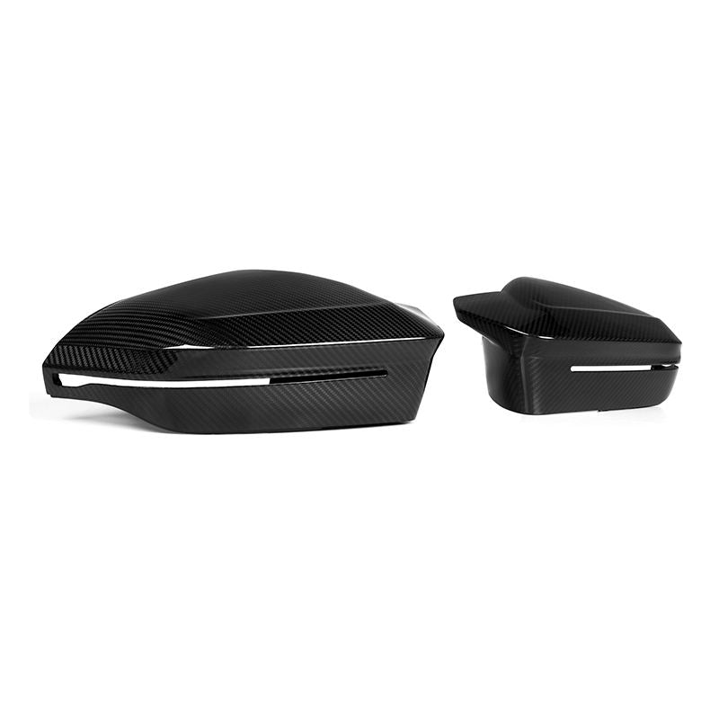 High-gloss carbon fiber side mirror covers in a horn-style design for BMW 5 Series M5 G90 G99 rear-view mirrors.